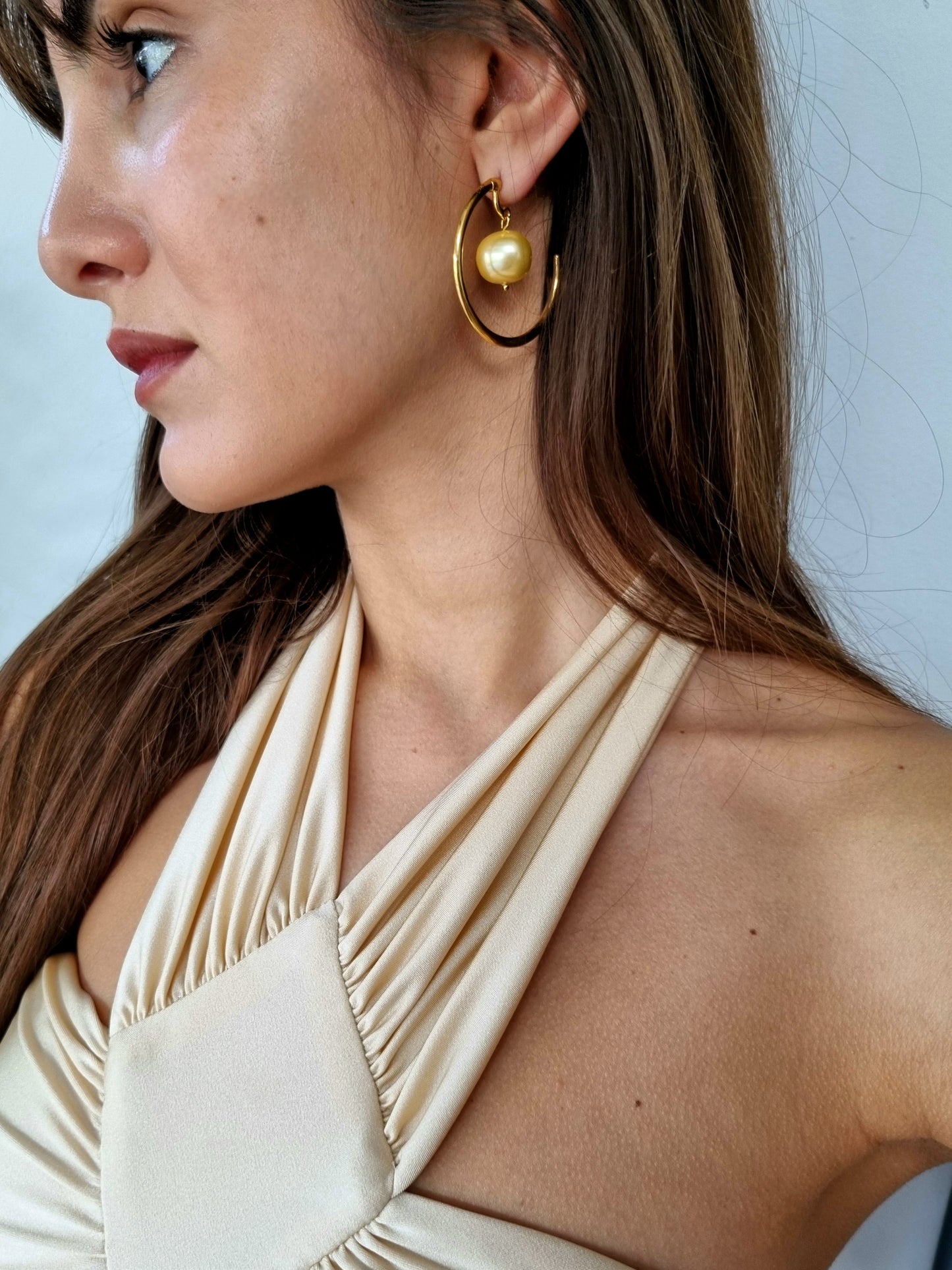 Gold plated hoop earrings with pearls