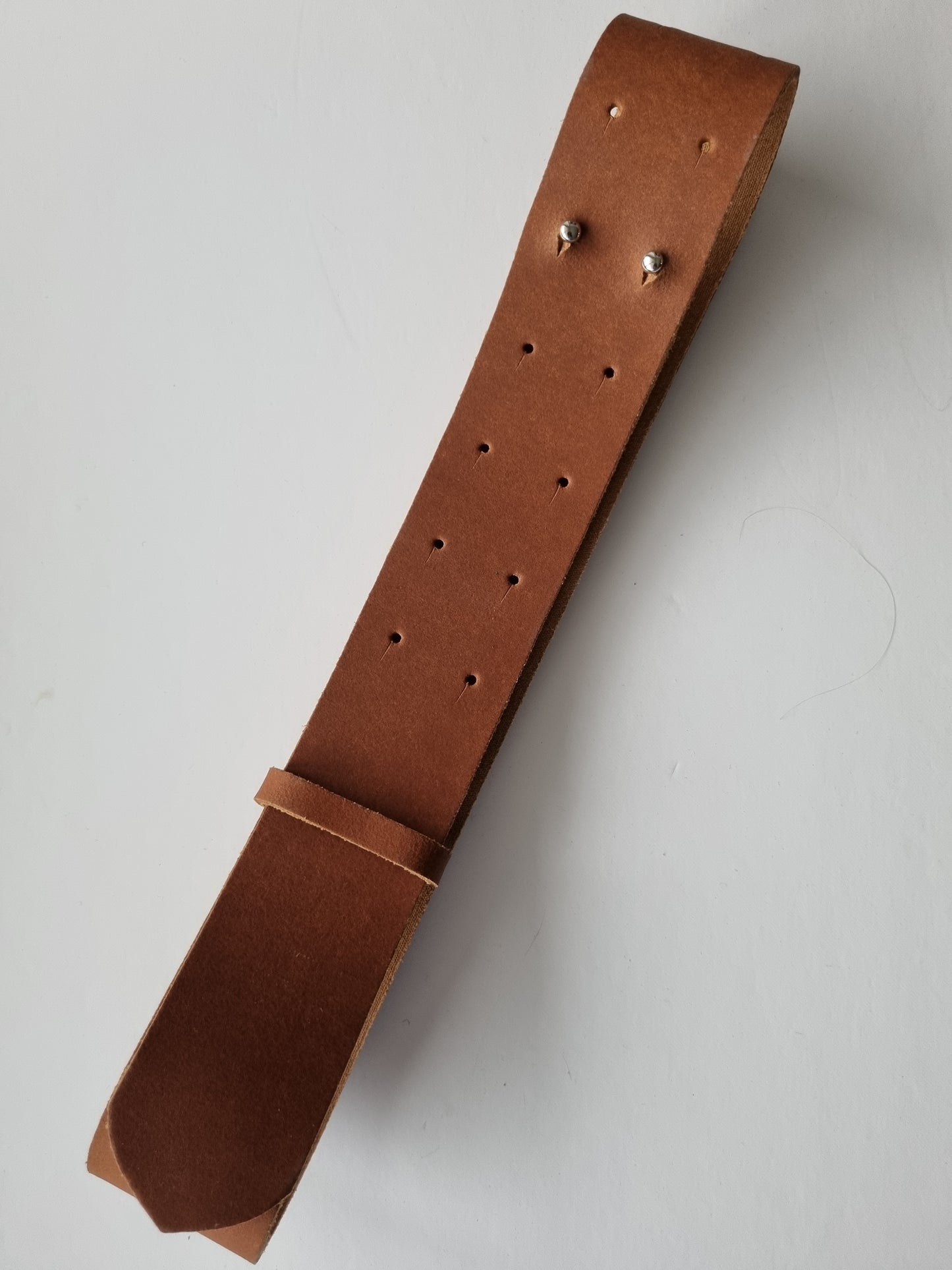 Leather belt with metal ornaments