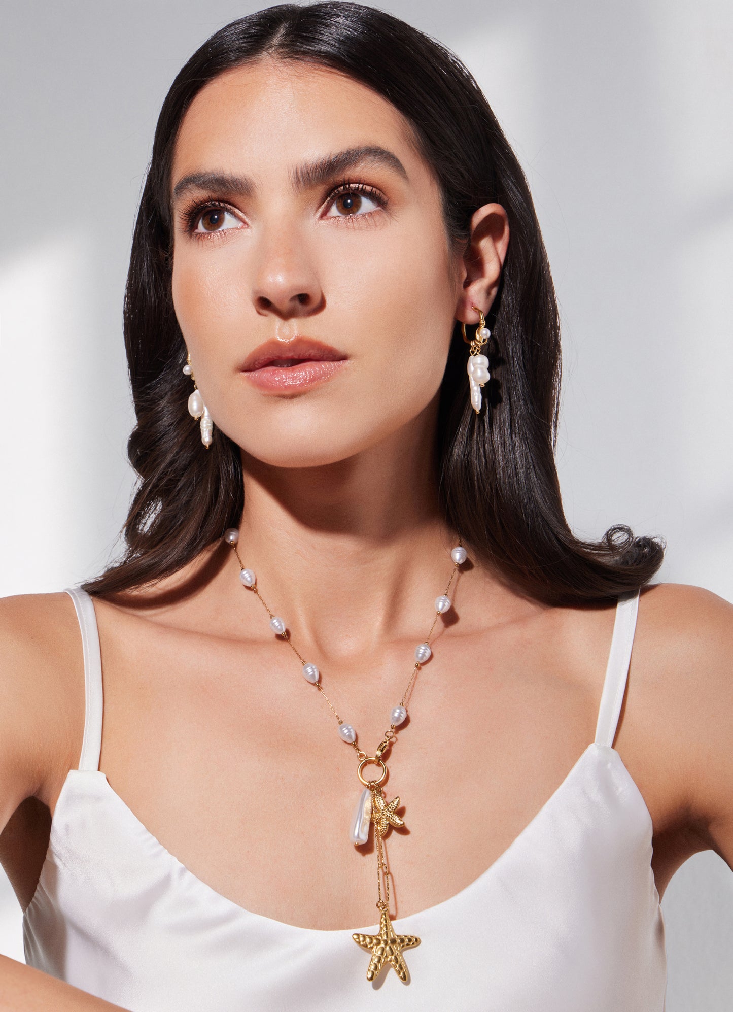 Steel earrings with fresh water pearls