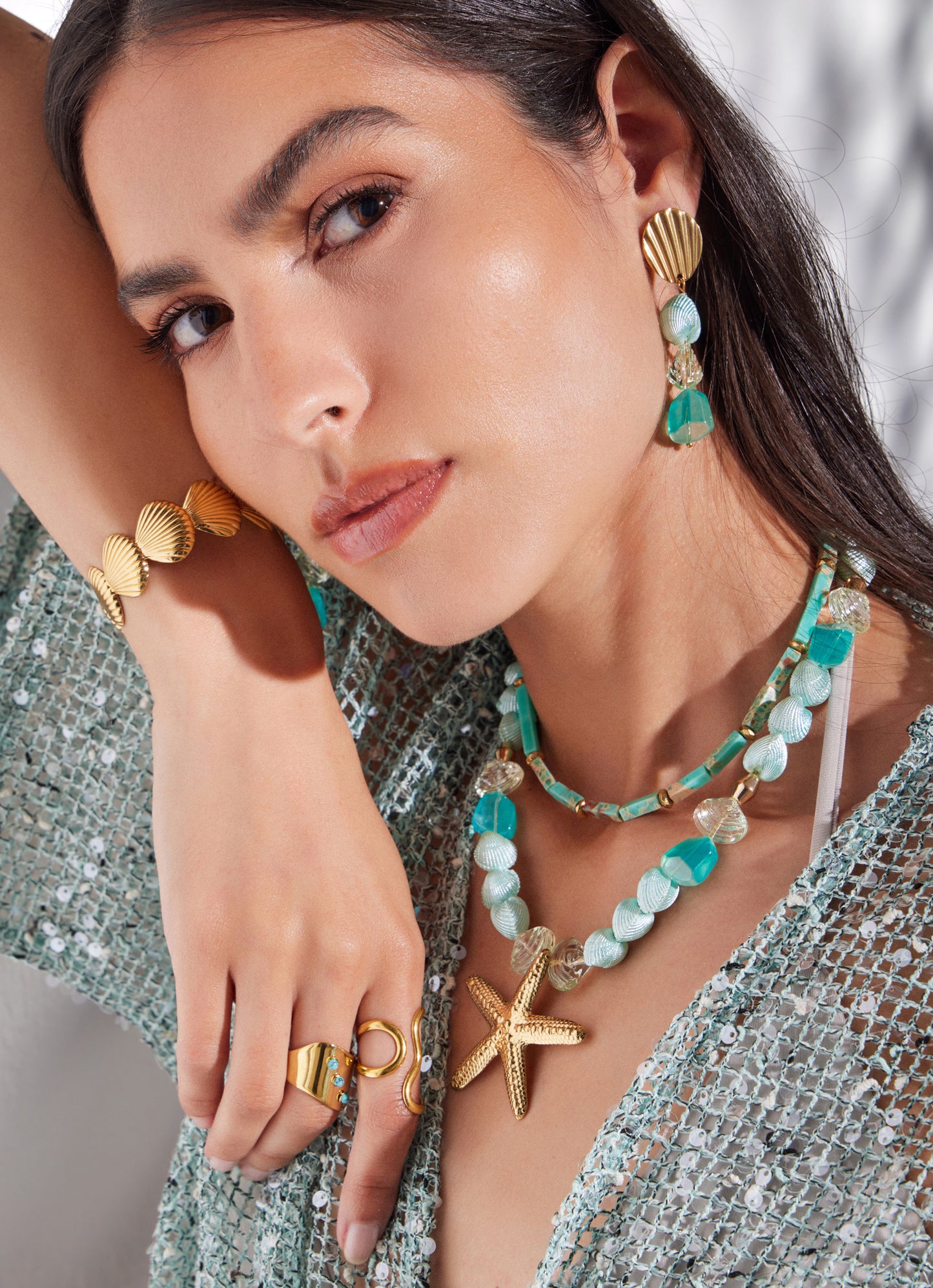 Earrings with crystals and shells