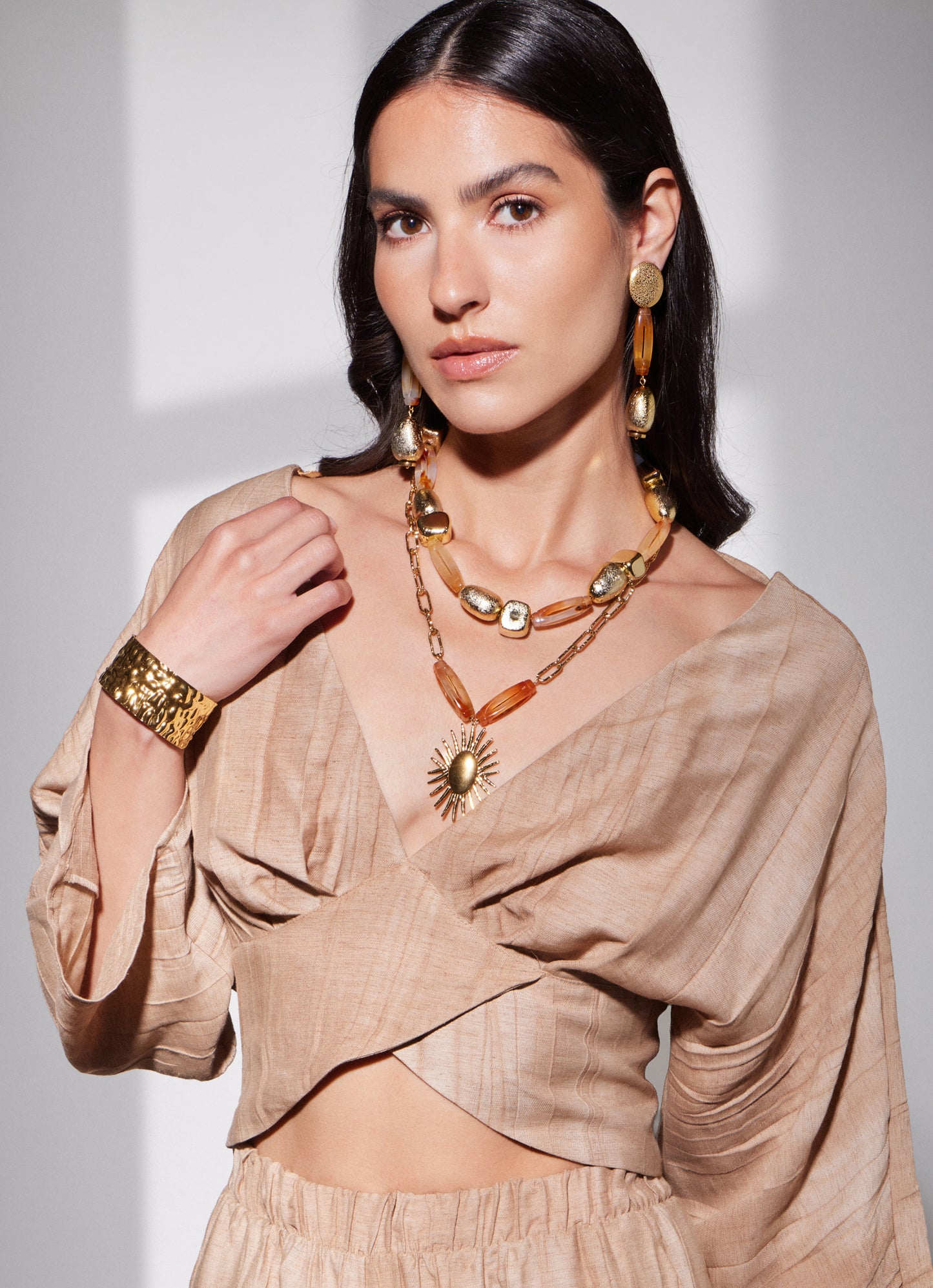 Necklace with a sun pendant