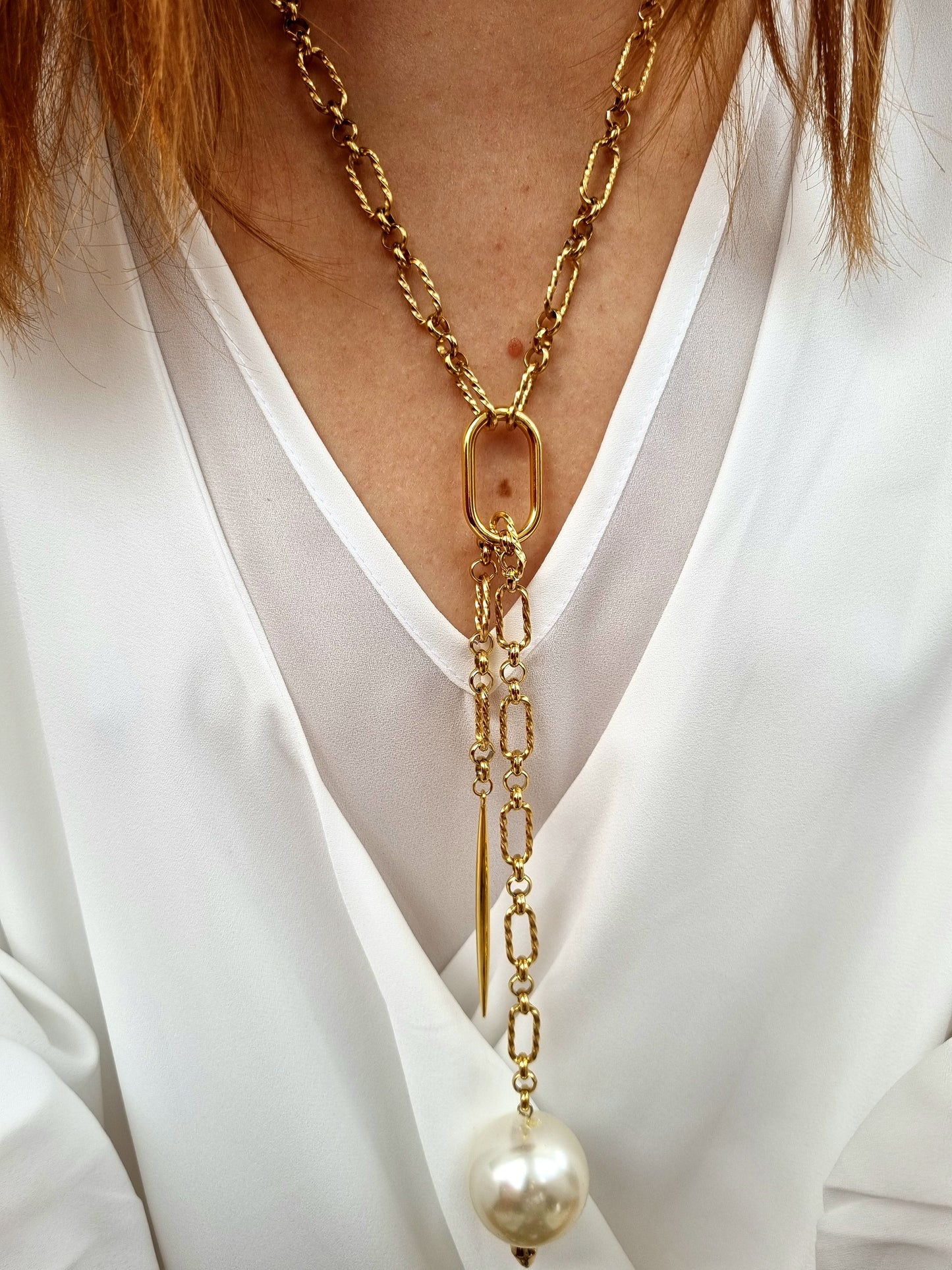 Steel chain necklace with oversized pearl