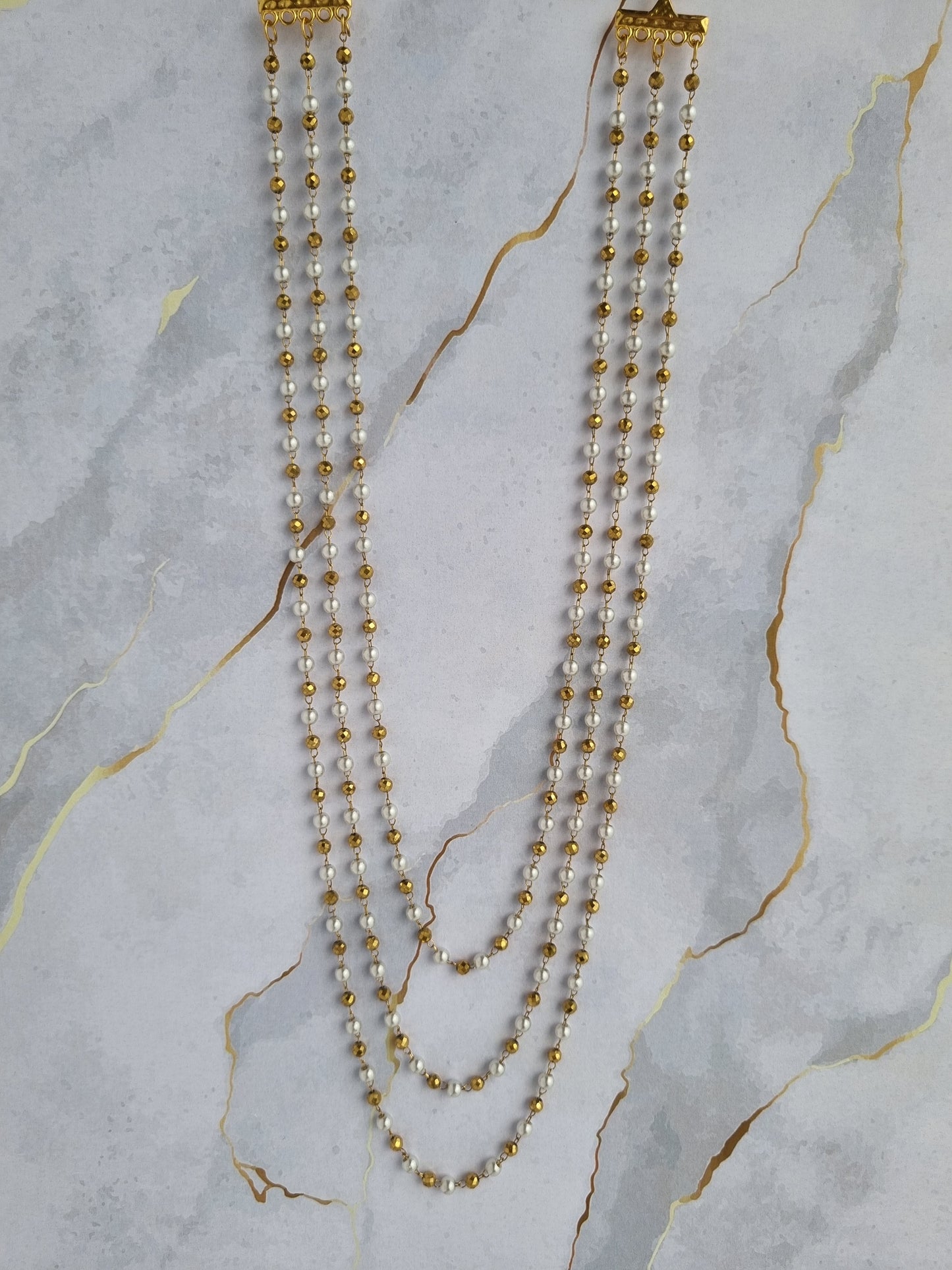 Steel 3ple necklace with pearls
