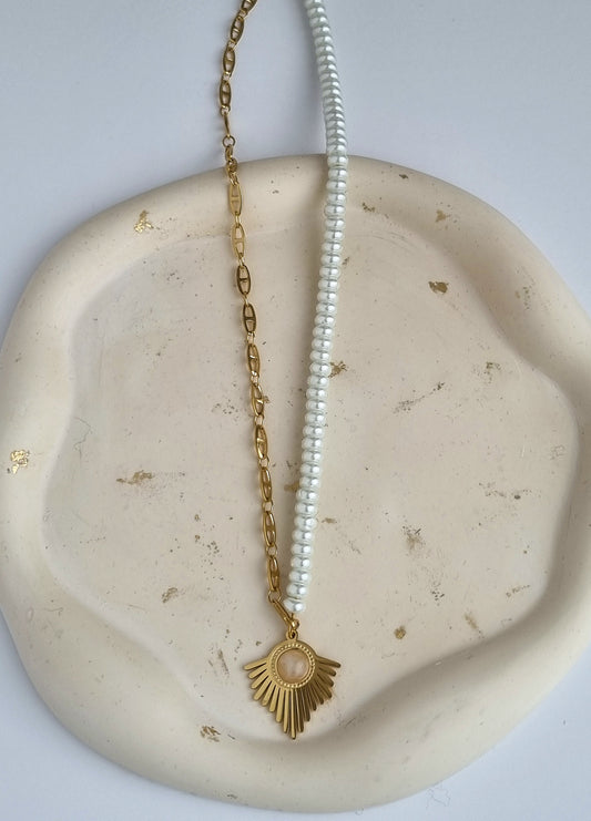 Necklace with steel chain,pearls and a steel pendant