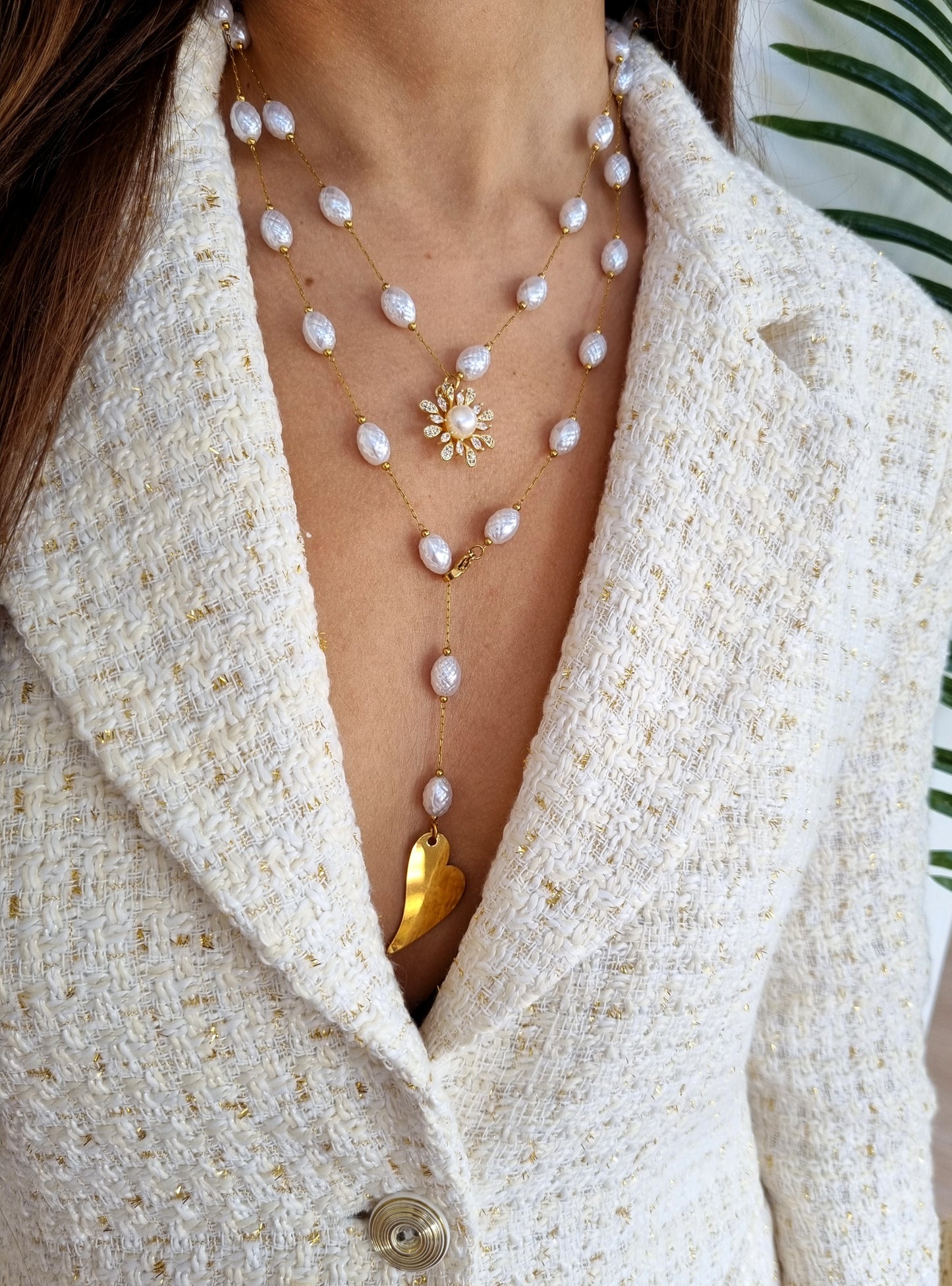 Steel necklace with pearls and a zircon flower