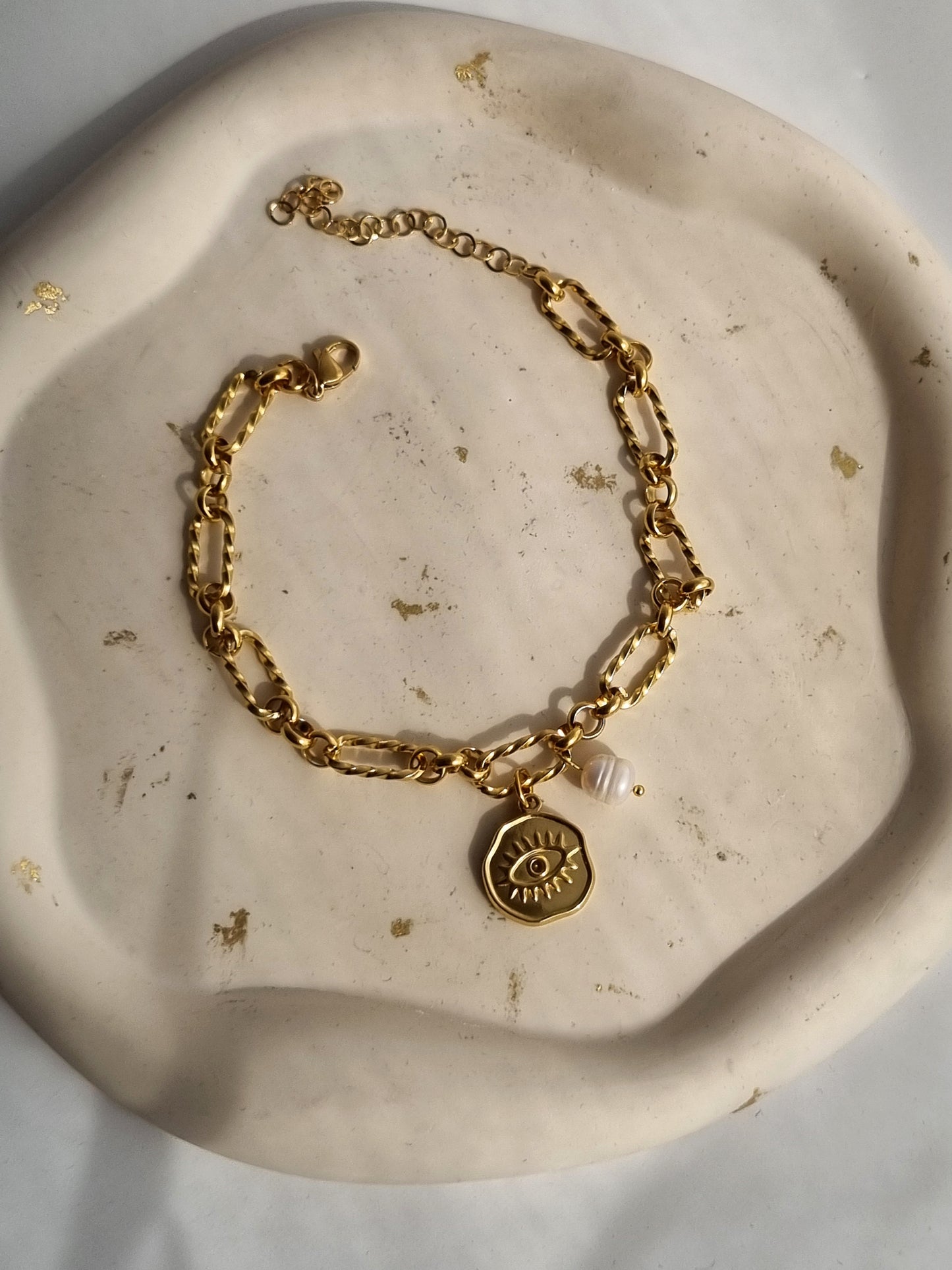 Steel anklet with steel eye charm and a pearl