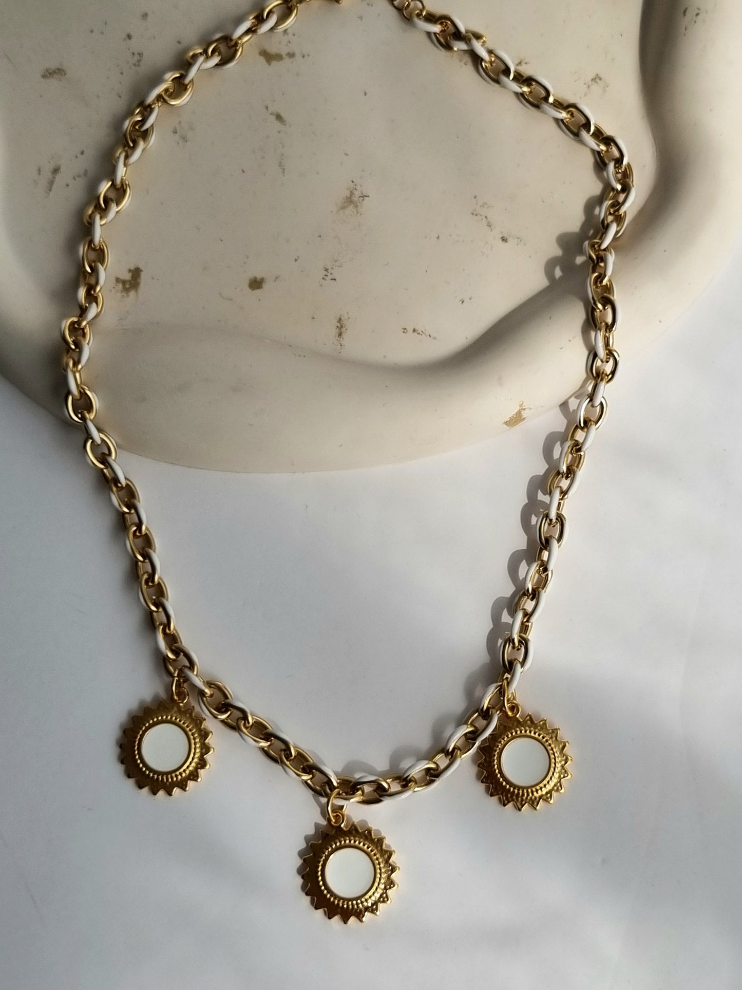 Steel necklace with sun charms