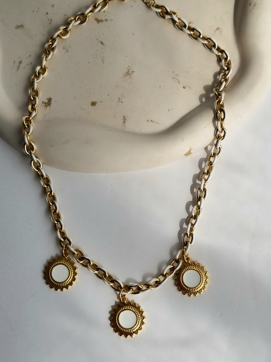 Steel necklace with sun charms