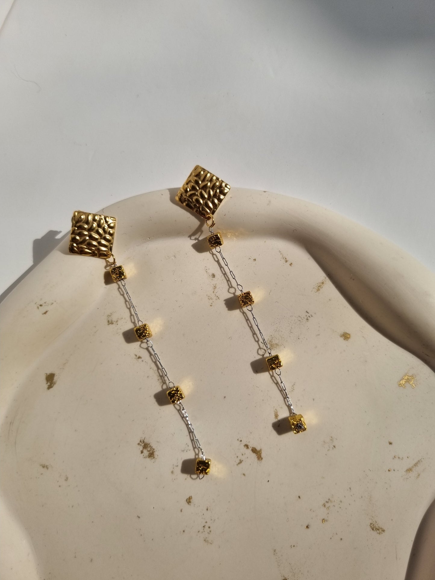 Steel earrings with cubes