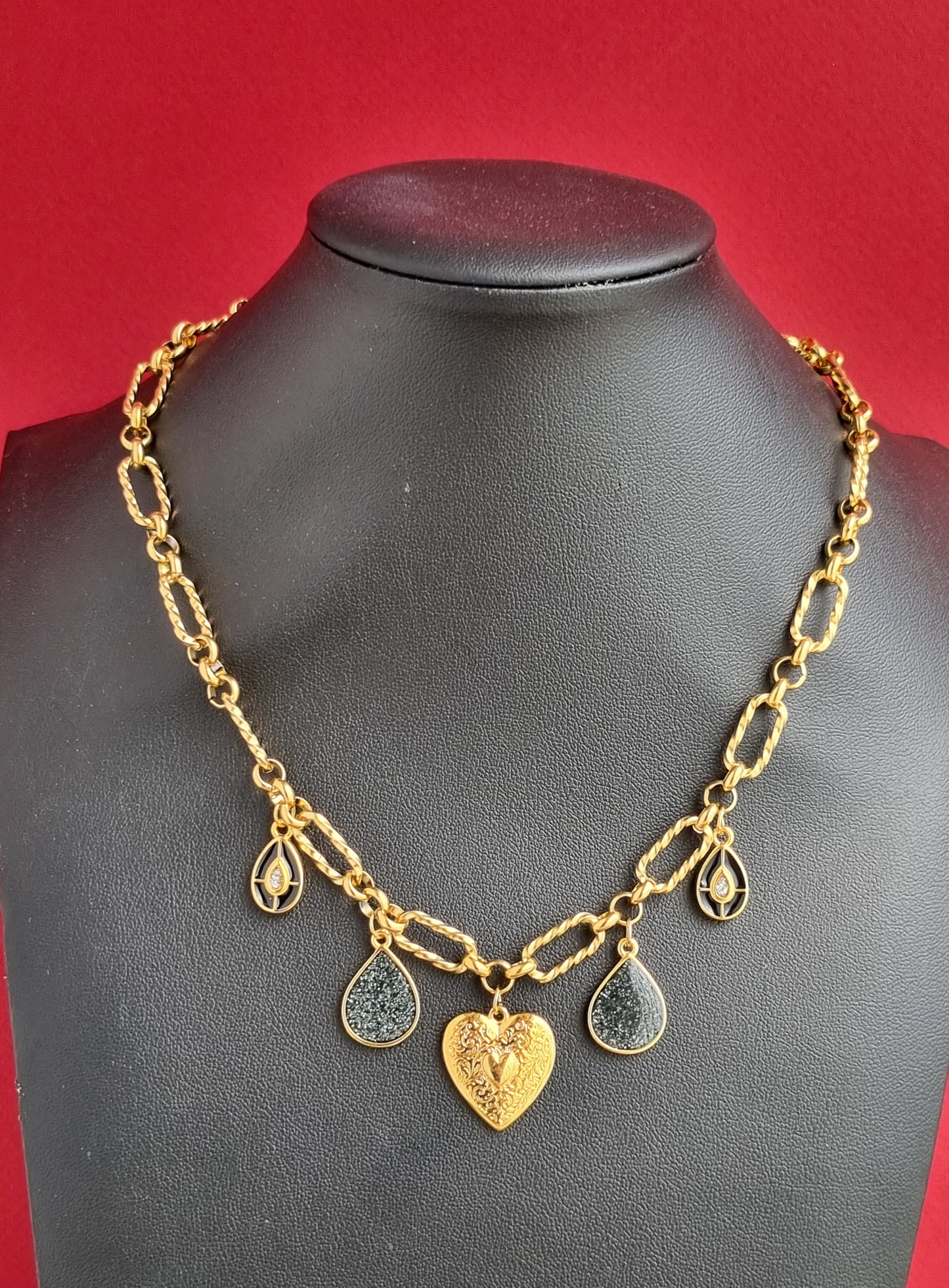 Steel necklace with charms