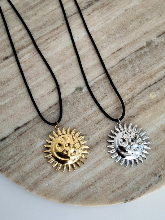 Cord necklace with sun pendant