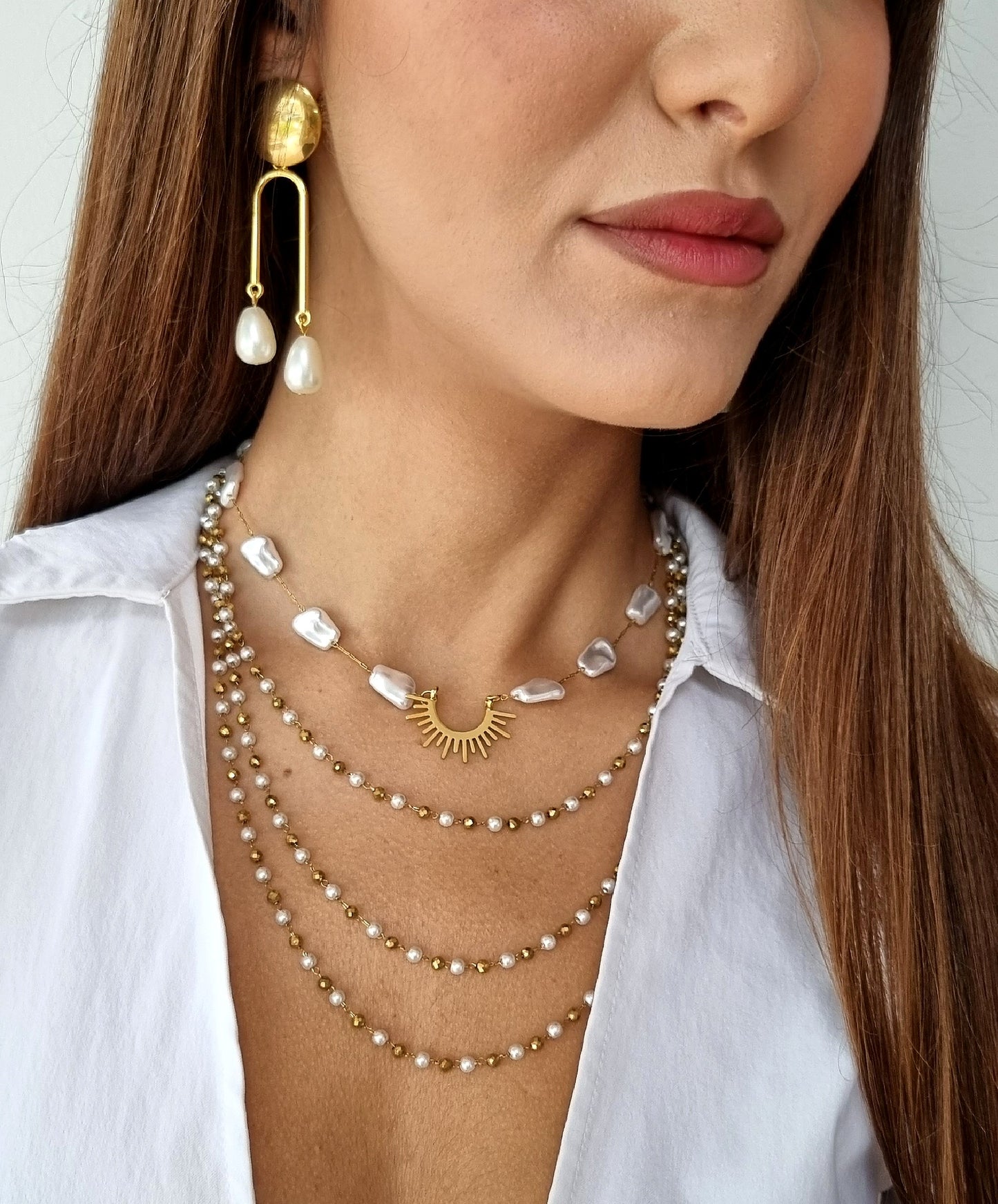 Steel 3ple necklace with pearls