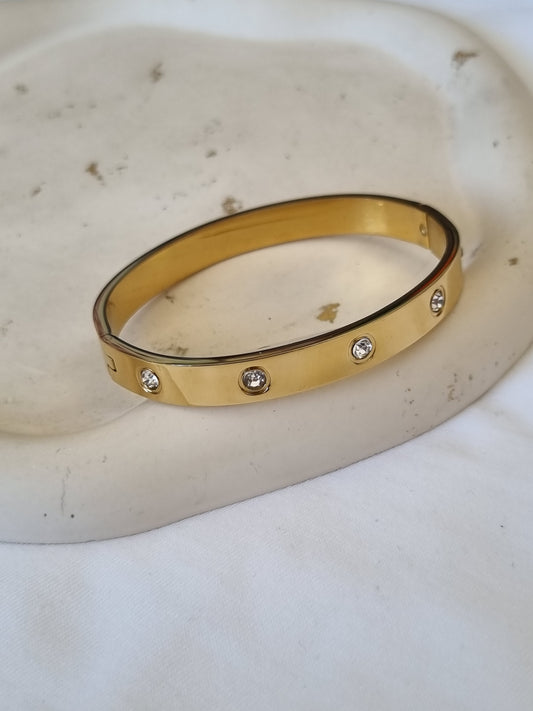Steel cuff with zircon crystals