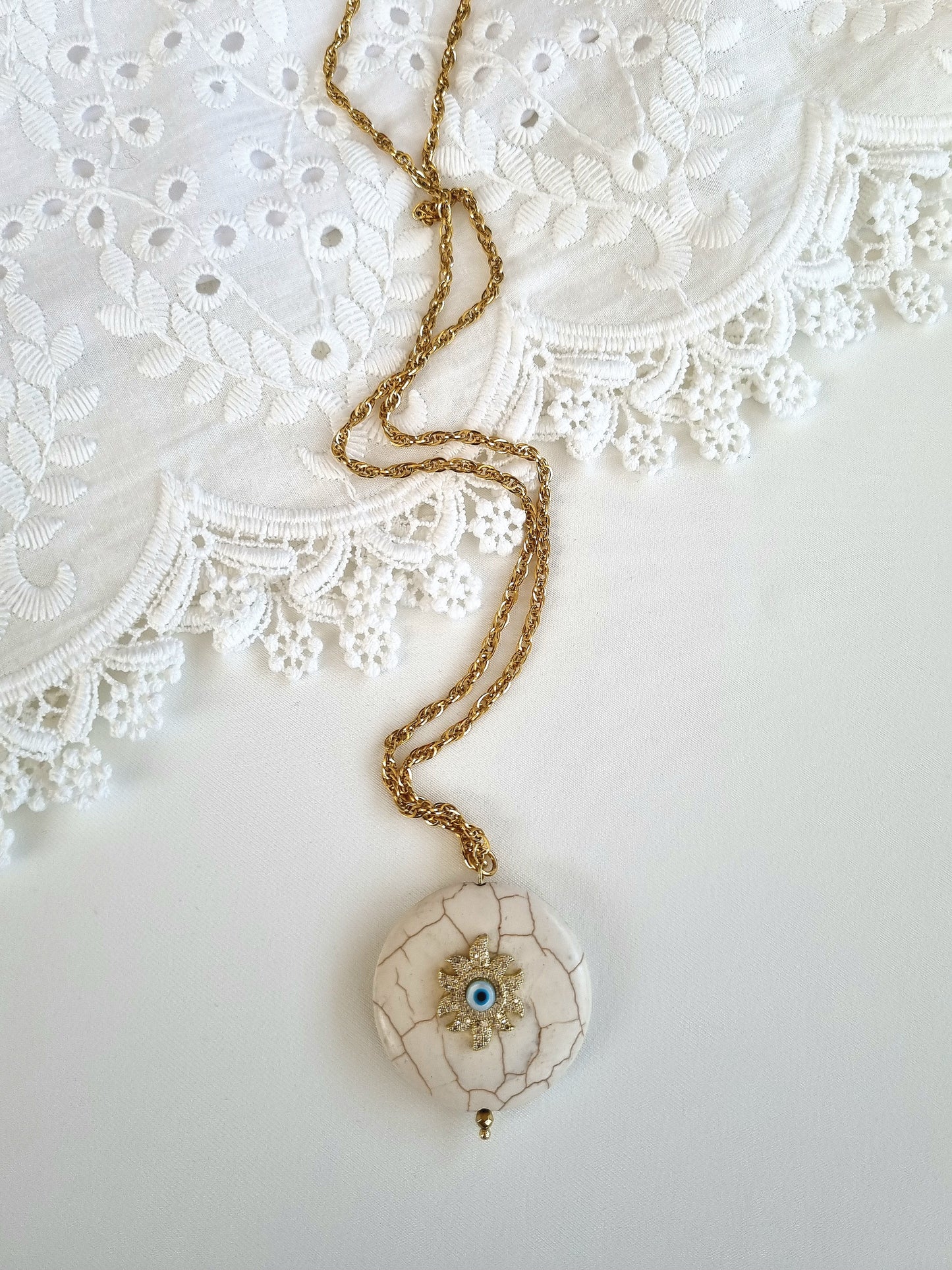 Howlite stone sun pendant