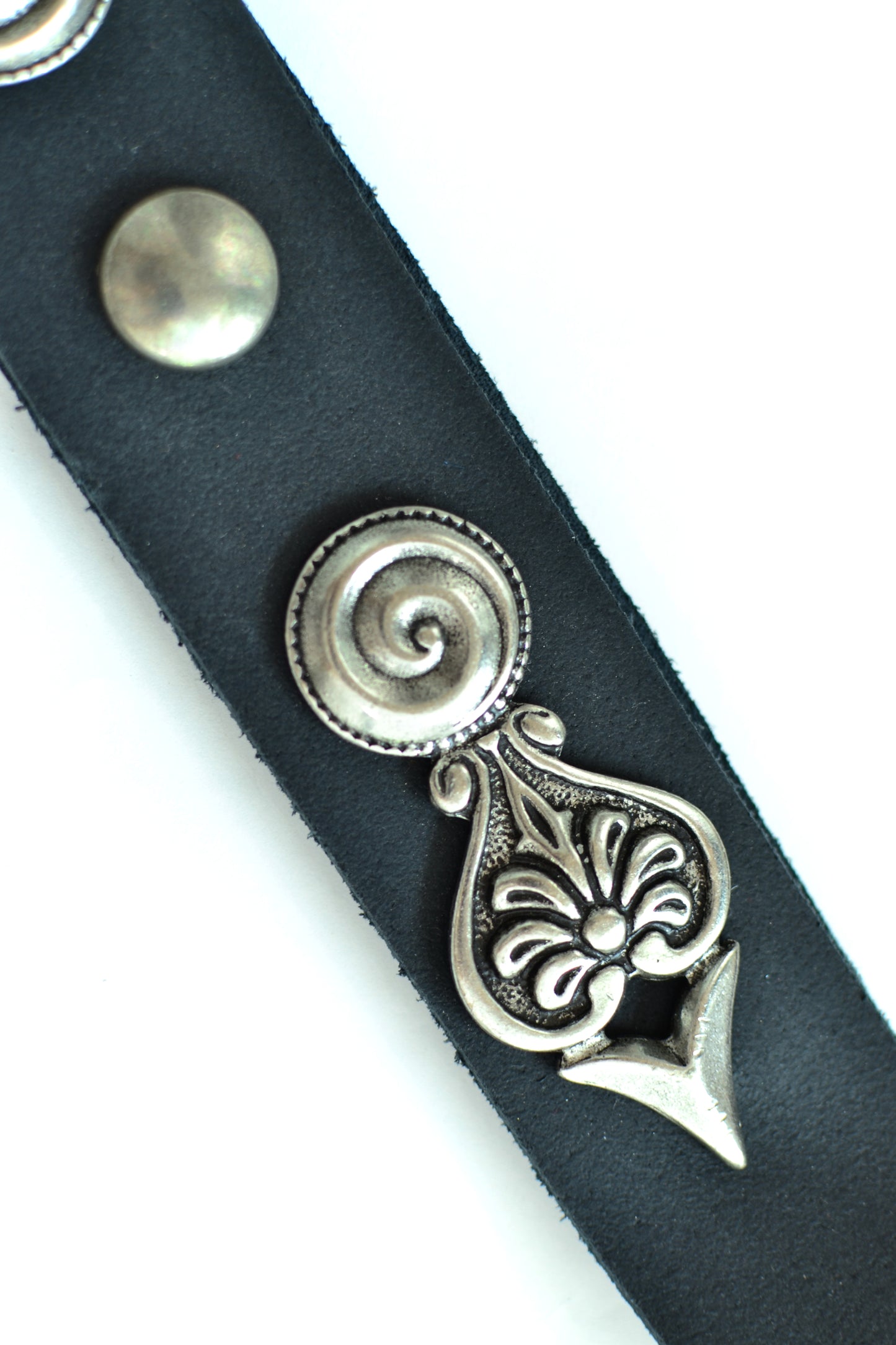 Leather belt with metal ornaments
